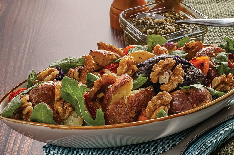 Pesto Smashed Fingerling Potatoes with Roasted Tomatoes